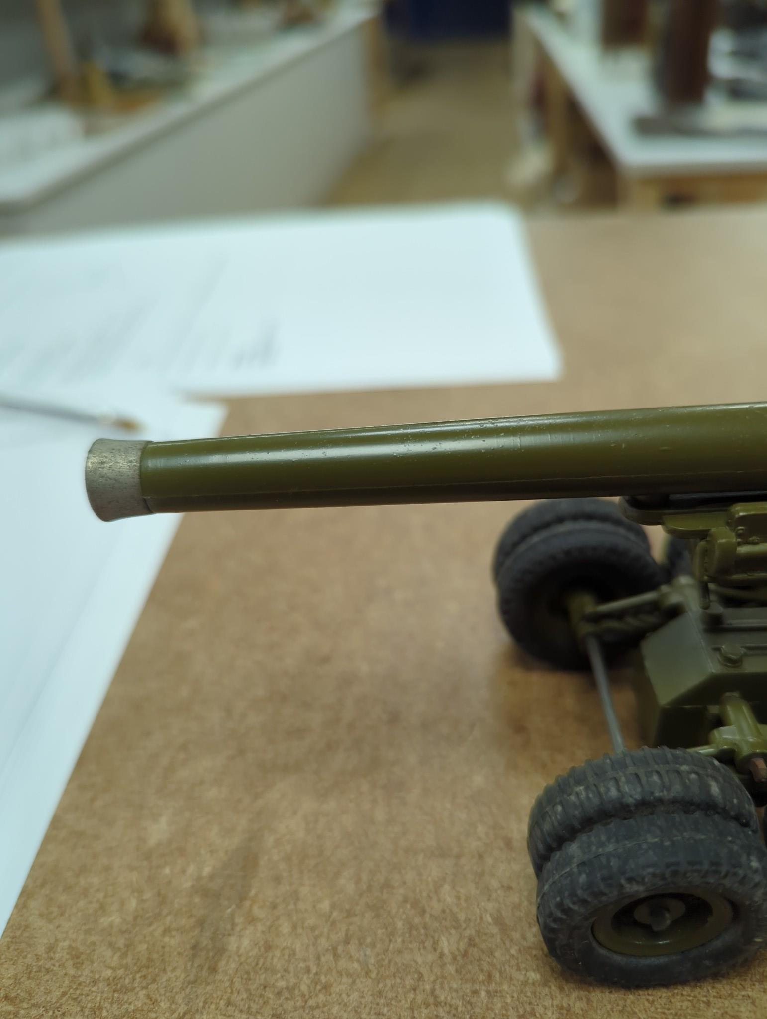 A selection of various Dinky military toys and a boxed Britains 155mm gun